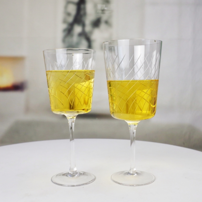 engraving of wine glasses.png